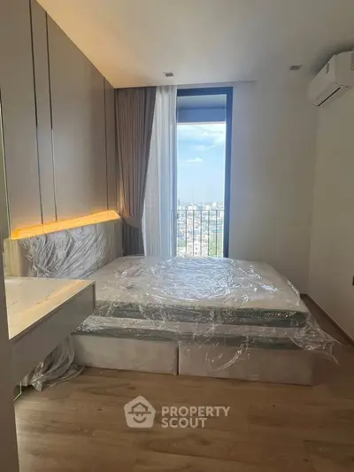 Modern bedroom with city view and stylish decor