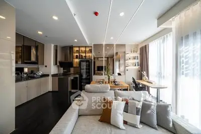 Spacious modern living room with open kitchen and elegant decor
