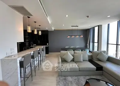 Luxurious modern living room with open kitchen and panoramic windows