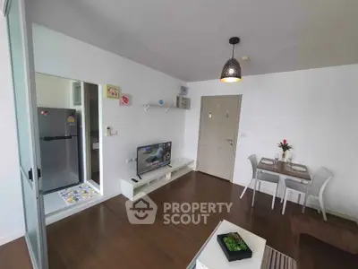 Modern living room with open kitchen and stylish decor