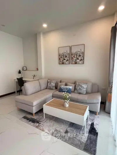 Modern living room with stylish decor and cozy seating area