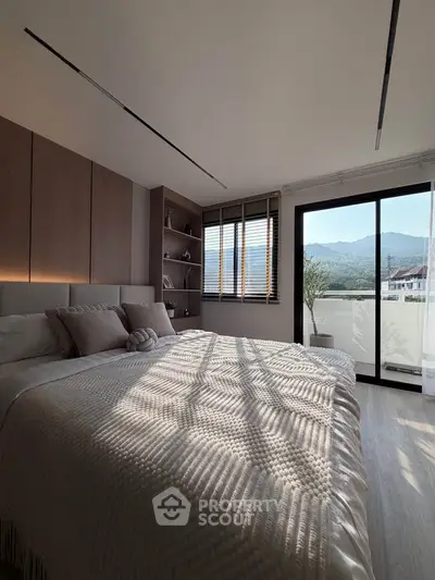 Luxurious bedroom with stunning mountain view and elegant decor
