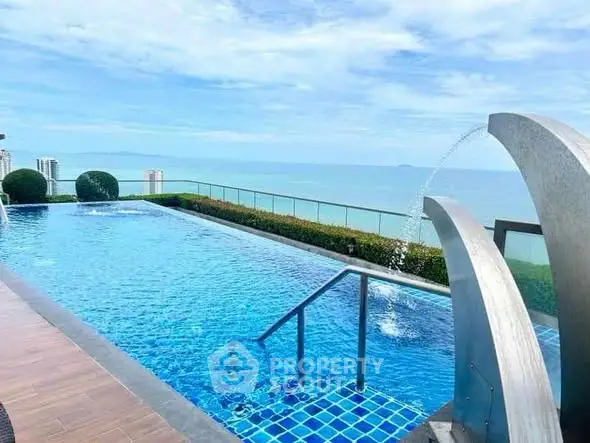 Luxurious rooftop pool with stunning ocean view and modern design.