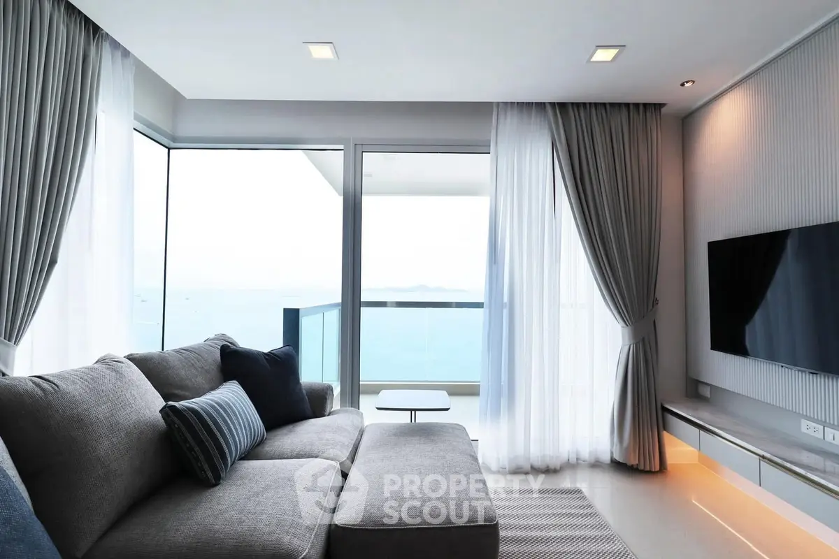 Luxurious living room with stunning sea view and modern decor
