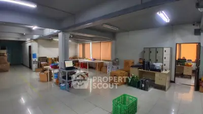 Spacious office space with ample storage and natural light, ideal for business operations.