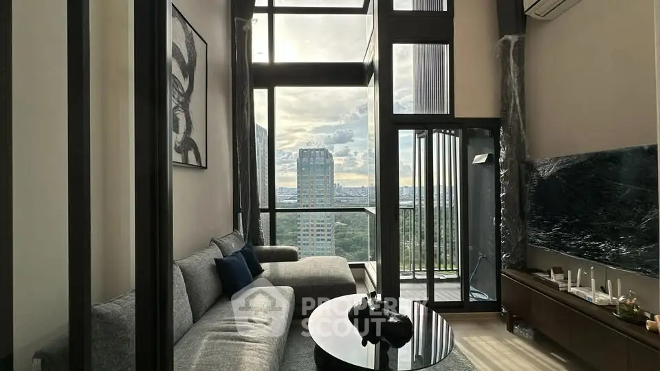 Luxurious high-rise living room with stunning city view and modern decor