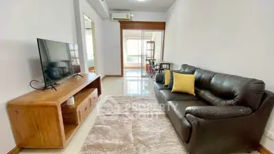 Spacious living room with modern furniture and natural light