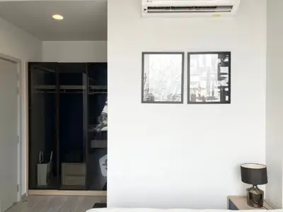 Modern bedroom with sleek wardrobe and stylish decor