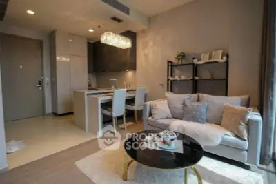 Modern living room with open kitchen and elegant decor