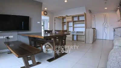 Modern living room with stylish wooden furniture and wall-mounted TV