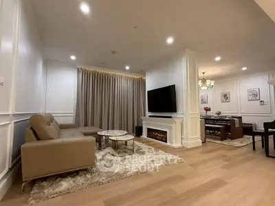 Elegant living room with modern decor and cozy fireplace