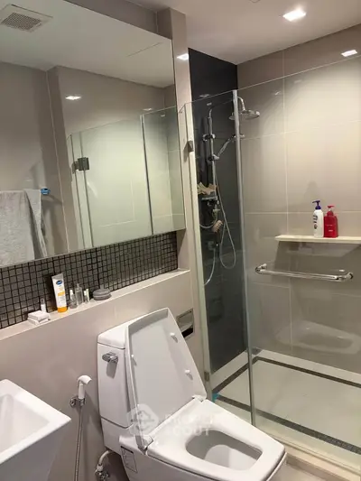 Modern bathroom with sleek shower and contemporary fixtures