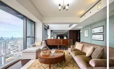 Luxurious living room with panoramic city view, elegant furniture, and stylish decor in high-rise apartment.