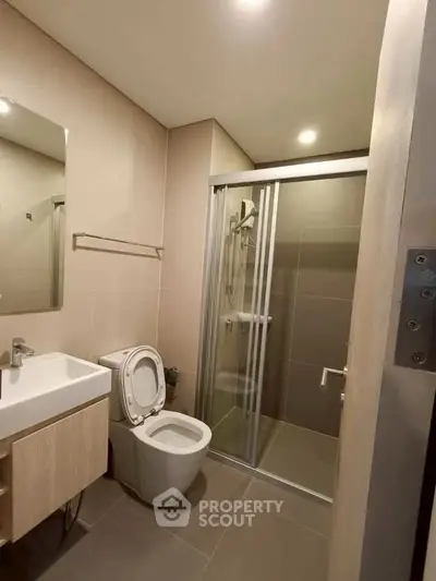 Modern bathroom with sleek shower and contemporary fixtures