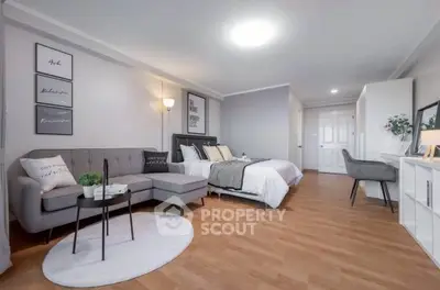 Spacious modern studio with cozy living area and stylish decor