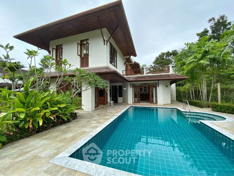 Luxurious tropical villa with private pool and lush garden, perfect for serene living.