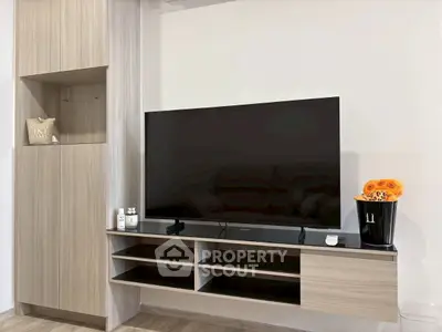 Modern living room with sleek TV unit and stylish decor