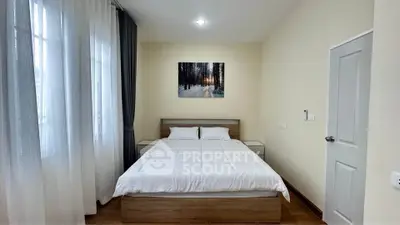 Cozy bedroom with modern decor and natural light