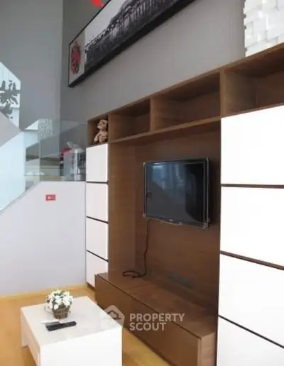 Modern living room with sleek TV unit and stylish decor