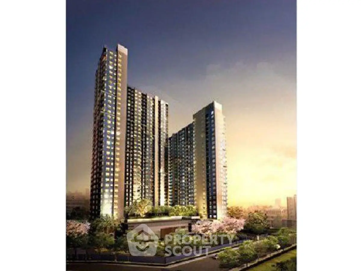 Stunning high-rise residential building with modern architecture and lush surroundings.