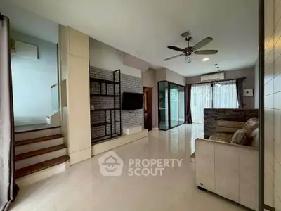 Spacious modern living room with sleek design and natural light