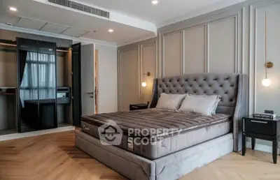 Luxurious bedroom with elegant decor and plush bed in modern apartment