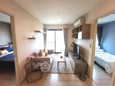 Modern apartment living room with cozy furniture and natural light