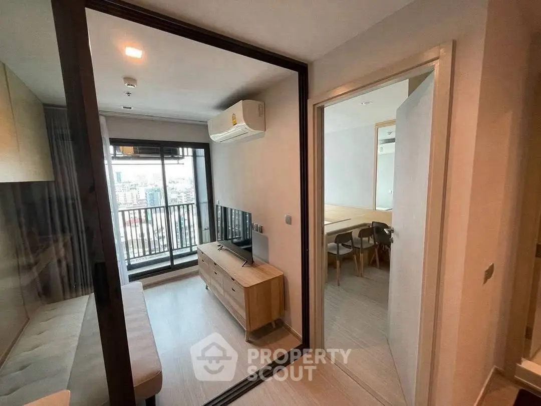 Modern apartment interior with balcony view and stylish furniture