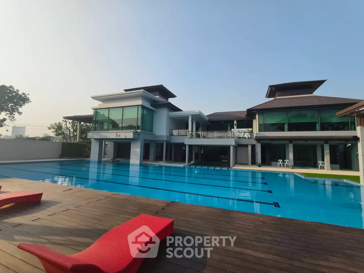 Luxurious modern villa with stunning pool and spacious deck area