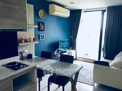 Modern living room with open kitchen and large window view