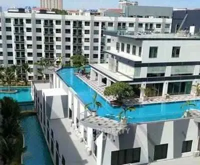 Luxurious rooftop pool with stunning city views in modern apartment complex
