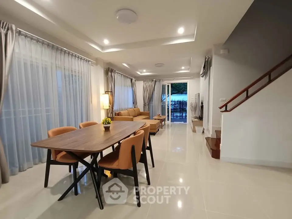 Spacious modern living room with dining area and elegant decor