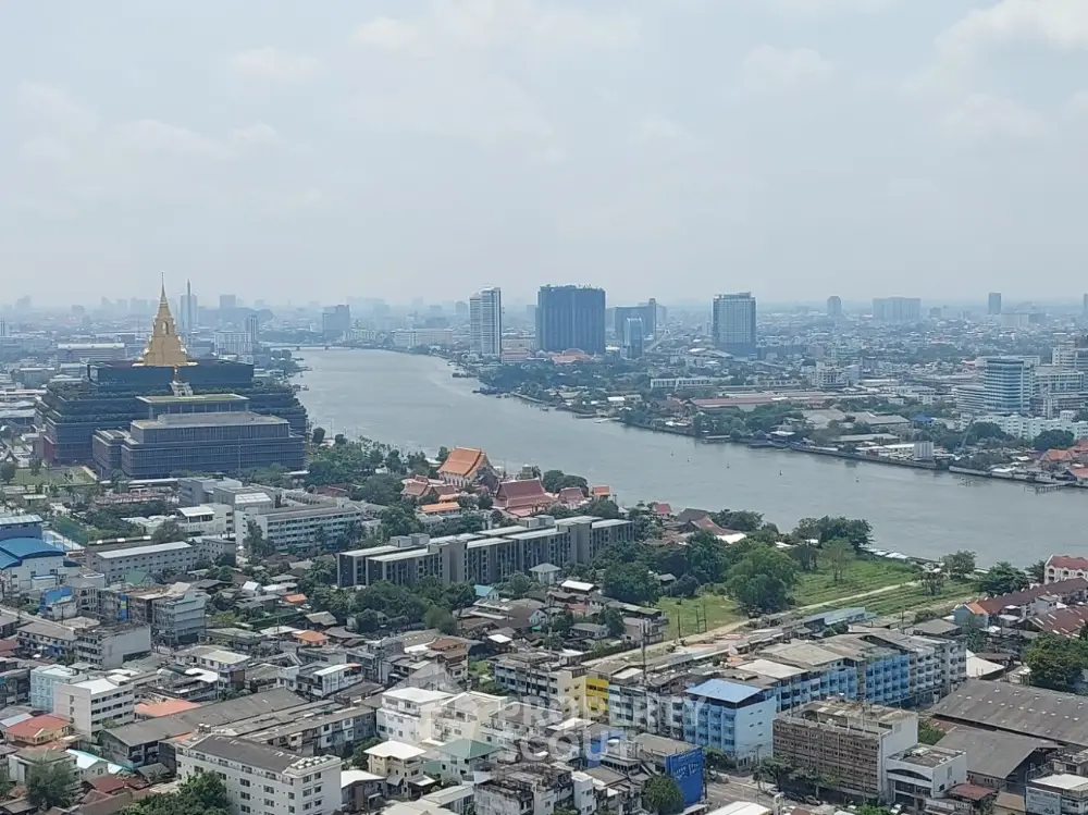 Stunning cityscape view with river and skyline, showcasing urban living at its finest.