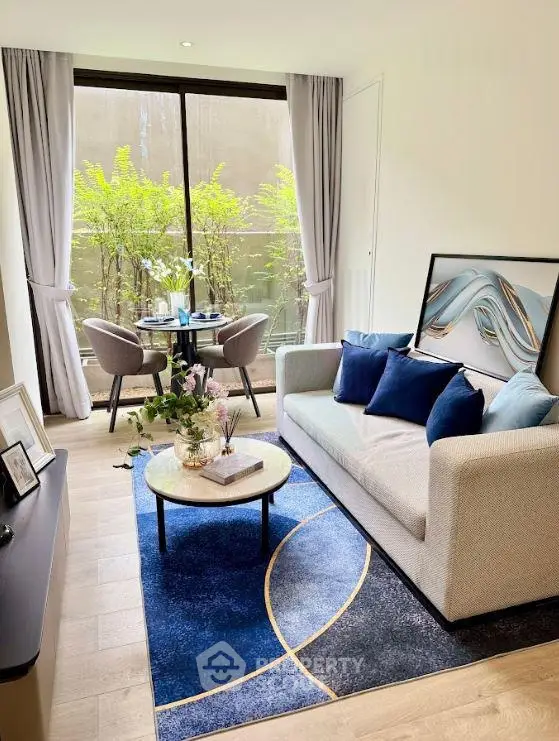 Modern living room with stylish decor and large window view