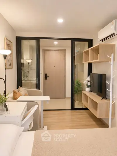 Modern studio apartment with stylish decor and smart storage solutions