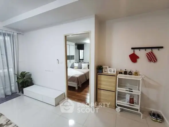 Modern bedroom with stylish decor and ample natural light