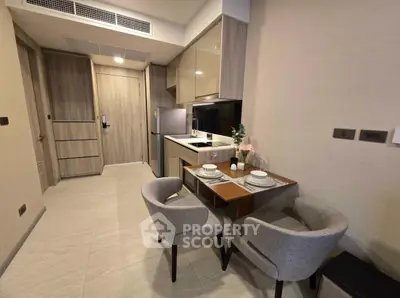 Modern kitchen with dining area in stylish apartment