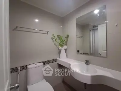 Modern bathroom with sleek fixtures and elegant decor