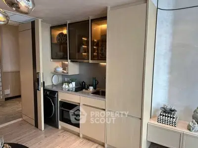 Modern kitchen with sleek cabinetry and built-in appliances