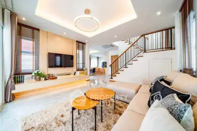 Spacious modern living room with stylish decor and cozy seating area