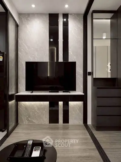 Modern living room with sleek TV setup and stylish decor