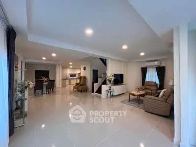 Spacious modern living room with open layout and elegant furnishings