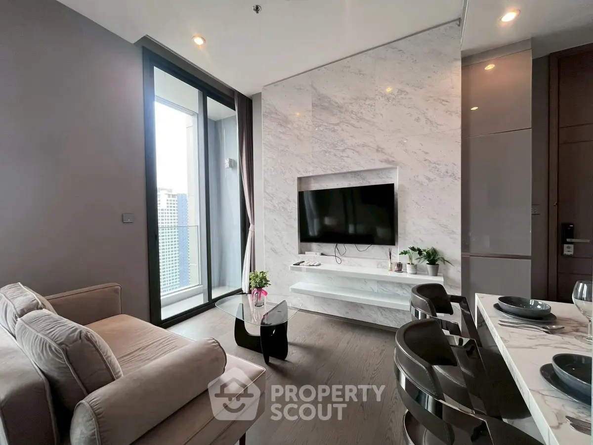 Luxurious modern living room with marble accent wall and city view balcony.