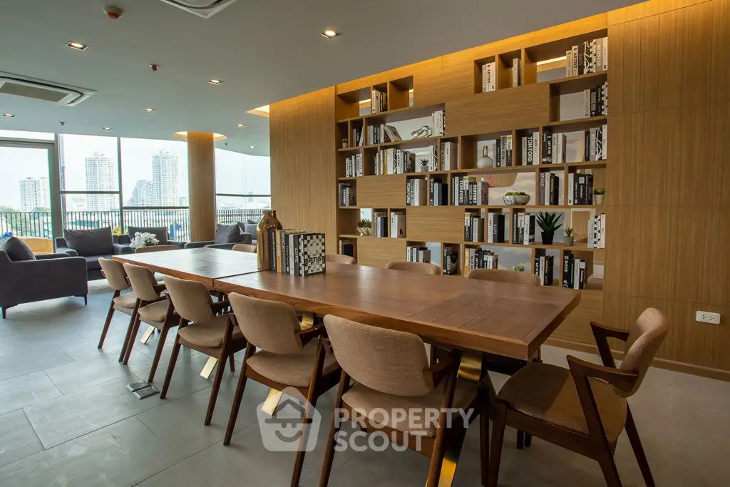 Luxurious modern living room with elegant wooden furniture and stunning city view.