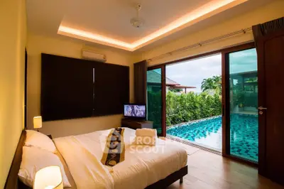 Luxurious bedroom with pool view and modern decor