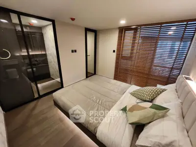 Modern bedroom with stylish wooden accents and cozy lighting