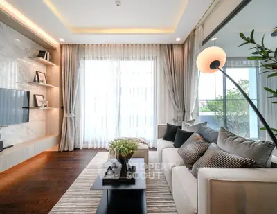 Luxurious modern living room with elegant decor and natural light