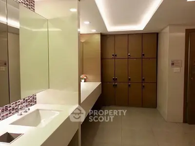 Modern bathroom with sleek design and ample storage space