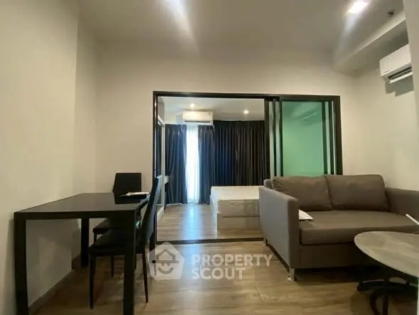 Modern studio apartment with open layout and stylish furnishings