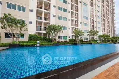 Luxurious condominium with stunning pool and modern architecture